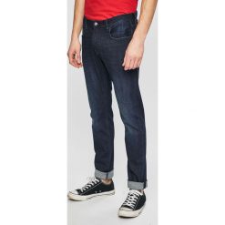 Armani Exchange - Jeansy. Niebieskie jeansy męskie Armani Exchange, z bawełny. W wyprzedaży za 299.90 zł.