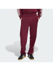 Adidas Spodnie dresowe KE1651 Bordowy Regular Fit. Czerwone spodnie sportowe męskie Adidas, m, bez wzorów, z dresówki. Za 279.99 zł.