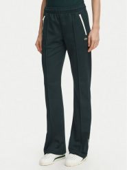 Lacoste Spodnie dresowe XF5253 Zielony ciemny Regular Fit. Zielone spodnie dresowe damskie Lacoste, bez wzorów, z dresówki. Za 724.99 zł.