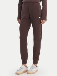 Guess Spodnie dresowe V4YB08 KCAY2 Brązowy Regular Fit. Brązowe spodnie dresowe damskie Guess, z aplikacjami, z dresówki. Za 349.99 zł.