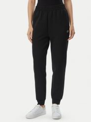 Lacoste Spodnie dresowe XF0189 Czarny Regular Fit. Czarne spodnie dresowe damskie Lacoste, bez wzorów, z dresówki. Za 428.99 zł.