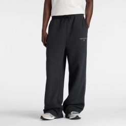 Spodnie męskie New Balance MB61M77EBK – czarne. Czarne spodnie sportowe męskie New Balance, l, z aplikacjami, z bawełny. Za 279.99 zł.
