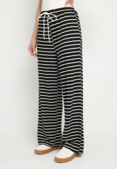 Czarne Szerokie Spodnie z Wiskozą i Wysokim Stanem w Paski Valmio. Czarne spodnie materiałowe damskie Born2be, bez wzorów, z jeansu, eleganckie, z podwyższonym stanem. Za 74.99 zł.