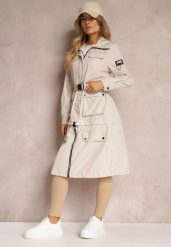 Beżowy Płaszcz z Regulacją Długości Aavya. Brązowe płaszcze damskie Renee, xl, z aplikacjami, eleganckie, bez kołnierzyka, bez kaptura. Za 119.99 zł.