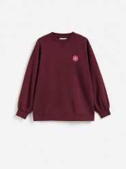 Bluza z nadrukiem na plecach - wielobarwny. Bluzy damskie Reserved, l, bez wzorów, z bawełny, bez ramiączek, bez kaptura. Za 139.99 zł.