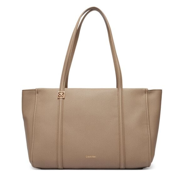 Torebka Calvin Klein. Brązowe shopperki damskie Calvin Klein, bez wzorów, bez dodatków. Za 407.99 zł.