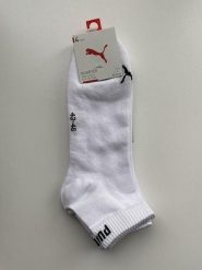 Skarpety unisex Puma QUARTER. Czarne skarpetki damskie Puma, bez wzorów, z syntetyku. Za 71.51 zł.