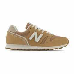Damskie trampki na co dzień New Balance 373 v2 Kobieta. Brązowe trampki i tenisówki damskie New Balance, bez wzorów, z materiału, bez zapięcia. Za 397.00 zł.