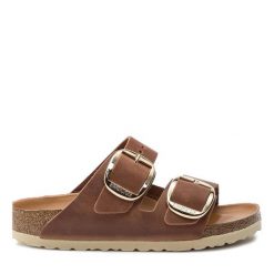 Klapki Birkenstock. Brązowe klapki damskie Birkenstock, bez wzorów, bez obcasa, bez zapięcia. Za 679.99 zł.