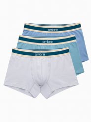 Klasyczne dopasowane bokserki męskie z ozdobną gumką w pasie – 3-pak mix OM-UNBO-0110 - XXL. Niebieskie bokserki męskie Ombre Clothing, bez wzorów, z bawełny. W wyprzedaży za 39.99 zł.