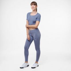 Legginsy fitness damskie Puma. Fioletowe legginsy damskie Puma, bez wzorów, ze skóry. Za 129.99 zł.