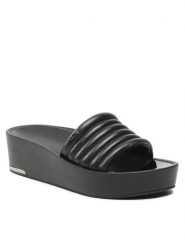 DKNY Klapki Jasna K4205489 Czarny. Czarne klapki damskie DKNY, bez wzorów, ze skóry, bez obcasa, bez zapięcia. Za 429.99 zł.