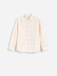 Bawełniana koszula regular fit - żółty. Żółte koszule męskie Reserved, l, bez wzorów, z bawełny, bez kołnierzyka, bez ramiączek. Za 119.99 zł.