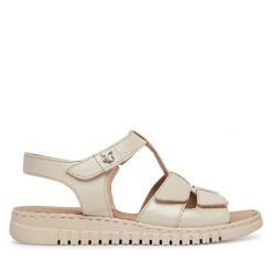 Sandały Caprice. Białe sandały damskie Caprice, bez wzorów, bez obcasa, na płaskiej podeszwie, bez zapięcia. Za 289.99 zł.