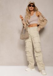 Jasnobeżowe Bawełniane Spodnie Bojówki High Waist Arcara. Brązowe spodnie materiałowe damskie Renee, bez wzorów, z bawełny, eleganckie, z podwyższonym stanem. Za 119.99 zł.