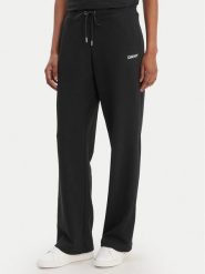 DKNY Sport Spodnie dresowe DP6P3794 Czarny Regular Fit. Czarne spodnie dresowe damskie DKNY Sport, bez wzorów, z dresówki, sportowe. Za 309.99 zł.