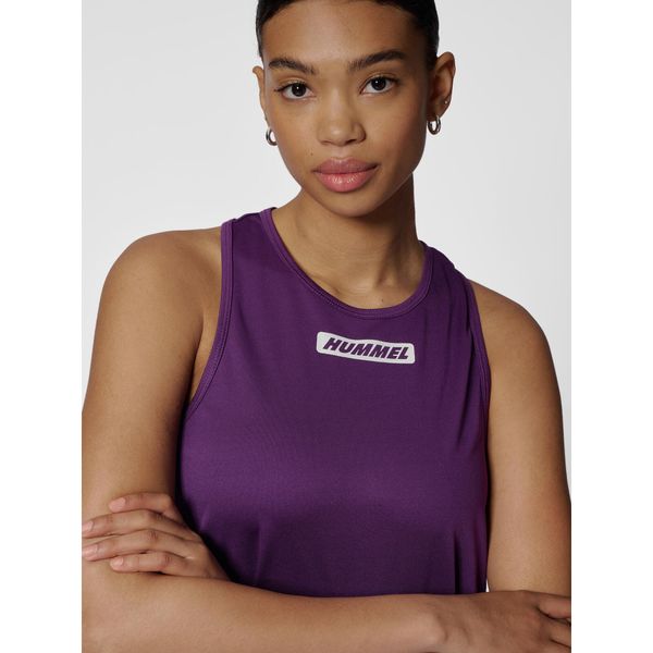 Damski tank top Hummel Te Tola. Fioletowe topy damskie Hummel, bez wzorów, z materiału, sportowe, bez kołnierzyka, bez ramiączek. Za 113.50 zł.