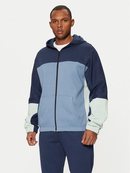 Champion Bluza 220399 Niebieski Standard Fit. Niebieskie bluzy męskie Champion, m, bez wzorów, z bawełny, bez ramiączek, bez kaptura. Za 239.99 zł.