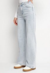 Jasnoniebieskie Casualowe Jeansy o Szerokim Kroju z Wysokim Stanem Sesariela. Niebieskie jeansy damskie Born2be, bez wzorów, z jeansu, eleganckie, z podwyższonym stanem, długie. Za 109.99 zł.