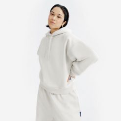 Bluza z kapturem damska Elementals. Brązowe bluzy damskie Decathlon, l, bez wzorów, z bawełny, bez ramiączek, z kapturem. Za 169.99 zł.