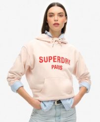 Luźna bluza z kapturem Sport Luxe. Fioletowe bluzy damskie Superdry, bez wzorów, z bawełny, sportowe, bez ramiączek, z kapturem. Za 354.30 zł.