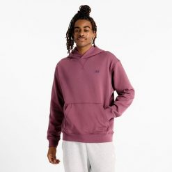 Bluza męska New Balance MT41534FDP – fioletowa. Fioletowe bluzy męskie New Balance, m, bez wzorów, z materiału, z kapturem. Za 269.99 zł.