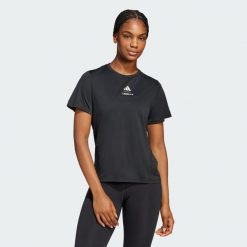 Koszulka Les Mills Graphic. Czarne bluzki damskie Adidas, xl, bez wzorów, sportowe, bez kołnierzyka, bez ramiączek. Za 199.00 zł.