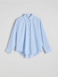 Koszula oversize z bawełny - jasnoniebieski. Niebieskie koszule damskie Reserved, l, bez wzorów, z bawełny, bez kołnierzyka, bez ramiączek. W wyprzedaży za 59.99 zł.