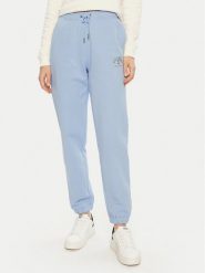 Guess Jeans Spodnie dresowe W5RB63 K68I4 Niebieski Regular Fit. Niebieskie spodnie dresowe damskie Guess Jeans, z aplikacjami, z bawełny. Za 169.99 zł.