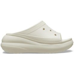 Klapki damskie Crocs Crush Slide Bone Os. Białe klapki damskie Crocs, bez wzorów, z materiału, sportowe, bez obcasa, bez zapięcia. Za 299.99 zł.
