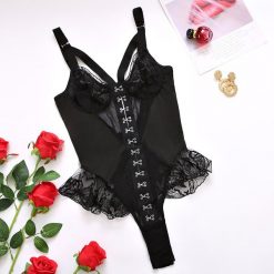 Body z haftem na specjalne okazje Kujtesa. Czarne body Intica, bez wzorów, z materiału. Za 119.00 zł.