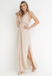Beżowy Kombinezon z Lnu i Wiskozy z Szerokimi Rozciętymi Nogawkami Yaneisa. Brązowe sukienki damskie Born2be, na imprezę, bez wzorów, z wiskozy, eleganckie, bez kołnierzyka, bez ramiączek. Za 149.99 zł.