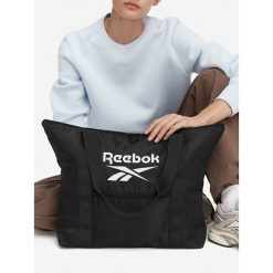 Torebka Reebok. Czarne shopperki damskie Reebok, bez wzorów, bez dodatków. Za 79.99 zł.