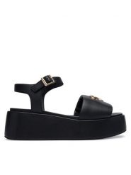 LOVE MOSCHINO Sandały JA16127I0OIA0000 Czarny. Czarne sandały damskie Love Moschino, bez wzorów, z materiału, bez obcasa, na koturnie, bez zapięcia. Za 939.99 zł.