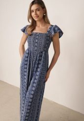 Niebieski Letni Kombinezon Casual z Wiskozy w Etno Haft z Falbankami Paninna. Niebieskie sukienki damskie Born2be, na co dzień, na lato, l, bez wzorów, z tkaniny, boho, bez kołnierzyka, bez ramiączek, proste. Za 109.99 zł.