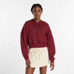 Bluza damska New Balance WJ51506MHB – bordowa. Czerwone bluzy damskie New Balance, s, bez wzorów, z bawełny, klasyczne, bez ramiączek, z kapturem. Za 269.99 zł.