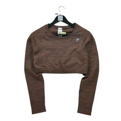 Second life - Koszulka fitnessowa dla kobiet w kolorze brązowym - Jak nowy. Brązowe bluzki damskie GYMSHARK, bez wzorów, sportowe, bez kołnierzyka, bez ramiączek. Za 122.63 zł.