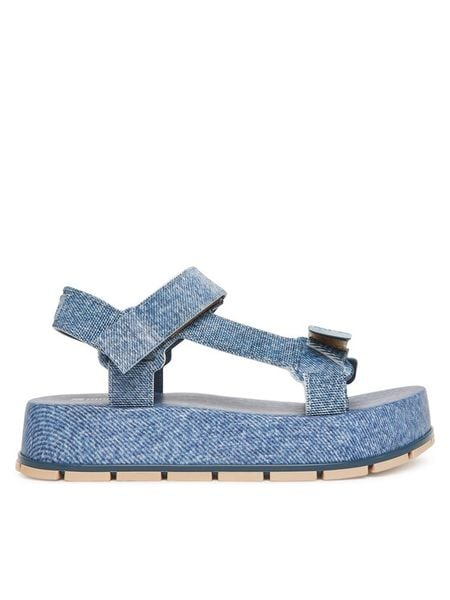 Melissa Sandały Melissa Flowing Platform Denim Ad M 36132 Niebieski. Niebieskie sandały damskie Melissa, bez wzorów, z denimu, bez obcasa, na koturnie, bez zapięcia. Za 599.99 zł.