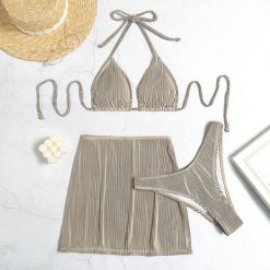 Bikini z pareo na plażę z elastycznego materiału Lorenzina. Zielone bikini Intica, bez wzorów. Za 149.00 zł.