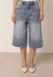 Niebieskie Jeansowe Szorty Casual o Kroju Typu Bermudy z Bawełną Pheradia. Niebieskie szorty damskie Born2be, bez wzorów, z bawełny, casualowe. Za 109.99 zł.