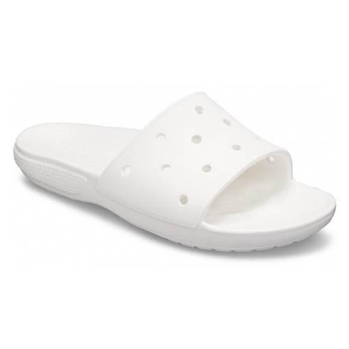 Klapki damskie Crocs Classic Slide. Białe klapki damskie Crocs, bez wzorów, z syntetyku, sportowe, bez obcasa, bez zapięcia. W wyprzedaży za 114.80 zł.