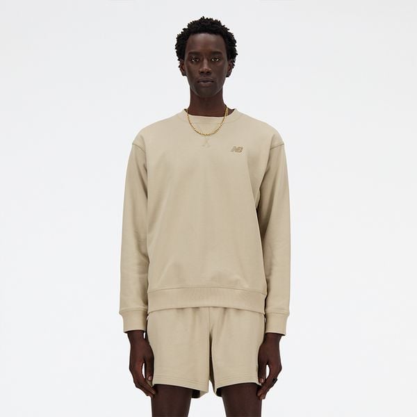 Bluza męska New Balance MT41506SOT – beżowa. Brązowe bluzy męskie New Balance, m, z aplikacjami, z bawełny, klasyczne, bez ramiączek, bez kaptura. Za 169.99 zł.
