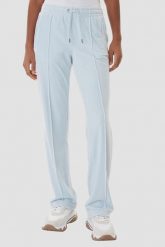 JUICY COUTURE Błękitne spodnie dresowe damskie z cyrkoniami Tina, Rozmiar XS. Niebieskie spodnie dresowe damskie Juicy Couture, bez wzorów, z dresówki, eleganckie. W wyprzedaży za 189.99 zł.