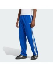 Adidas Spodnie dresowe adicolor Firebird KD4079 Niebieski Regular Fit. Niebieskie spodnie sportowe męskie Adidas, m, bez wzorów, z dresówki. Za 299.99 zł.