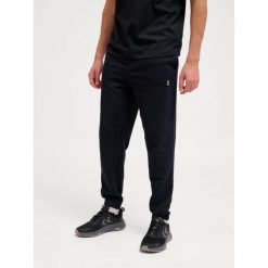 Spodnie do biegania Hummel Pulse. Czarne spodnie sportowe męskie Hummel, l, bez wzorów, z dresówki, do biegania. Za 170.00 zł.