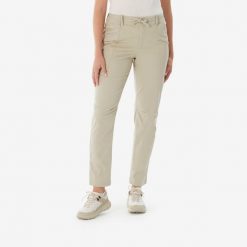 Spodnie turystyczne damskie Quechua NH500 Regular. Brązowe spodnie sportowe damskie QUECHUA, na lato, bez wzorów, z elastanu, sportowe, trekkingowe. Za 119.98 zł.