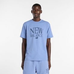 Koszulka męska New Balance MT61X6EQAA3 – niebieska. Niebieskie koszulki sportowe męskie New Balance, m, bez wzorów, z bawełny, bez ramiączek. Za 139.99 zł.