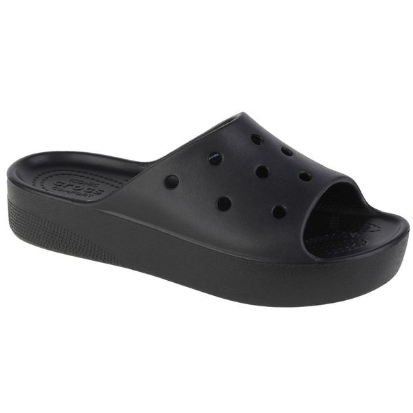 Klapki Crocs Classic Platform Slide Z Klapkami Damskie. Czarne klapki damskie Crocs, bez wzorów, z gumy, bez obcasa, bez zapięcia. Za 304.00 zł.