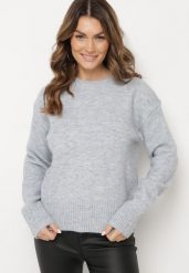 Jasnoniebieski Sweter o Klasycznym Fasonie z Wełną Avartissa. Niebieskie swetry nierozpinane damskie Born2be, na zimę, bez wzorów, z wełny, klasyczne, bez kołnierzyka, bez ramiączek. Za 139.99 zł.