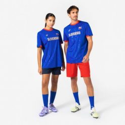 Koszulka piłkarska Słowacja 2026 dla kibiców. Czerwone bluzki damskie KIPSTA, l, bez wzorów, z materiału, sportowe, bez kołnierzyka, bez ramiączek. Za 44.99 zł.